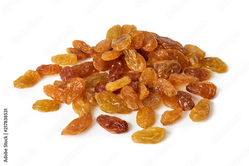 Heap of yellow raisins isolated on white background