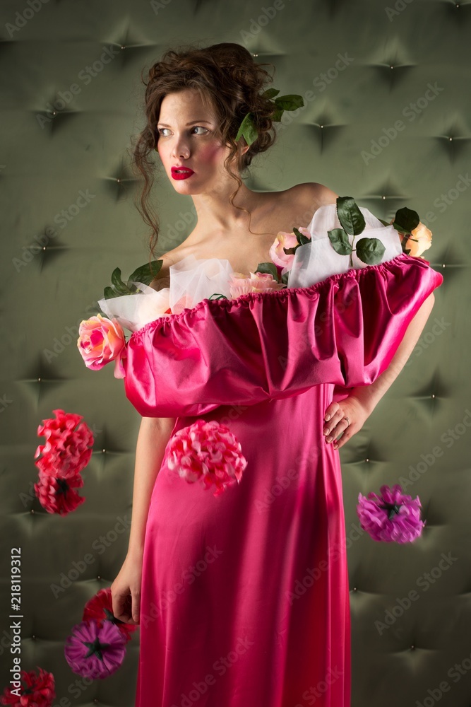 Portrait of an Elegant Woman in Pink Dress with Flowers