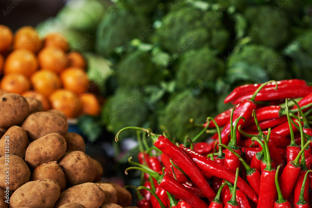 Farm fresh vegetables with red and colorful ripe chili pepper, young potatoes. Different fresh farm 