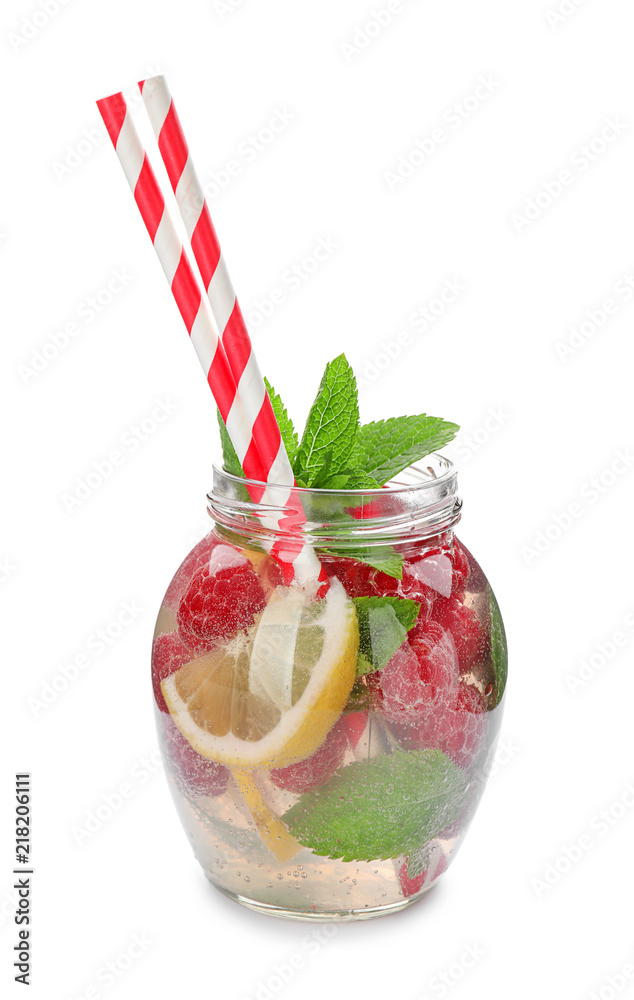 Glass jar of fresh raspberry mojito on white background