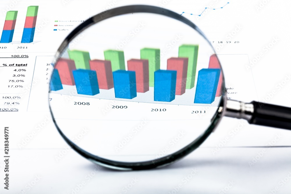 Magnifying Glass on the Document with Graph - Close Up