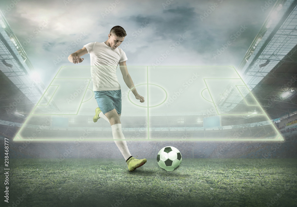 Soccer player on a football field in dynamic action at summer day