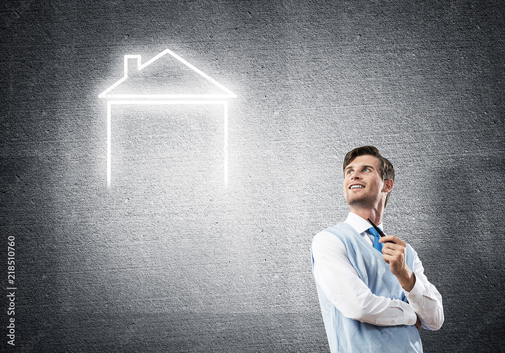 Elegant banker wearing red tie and house sign as banking concept