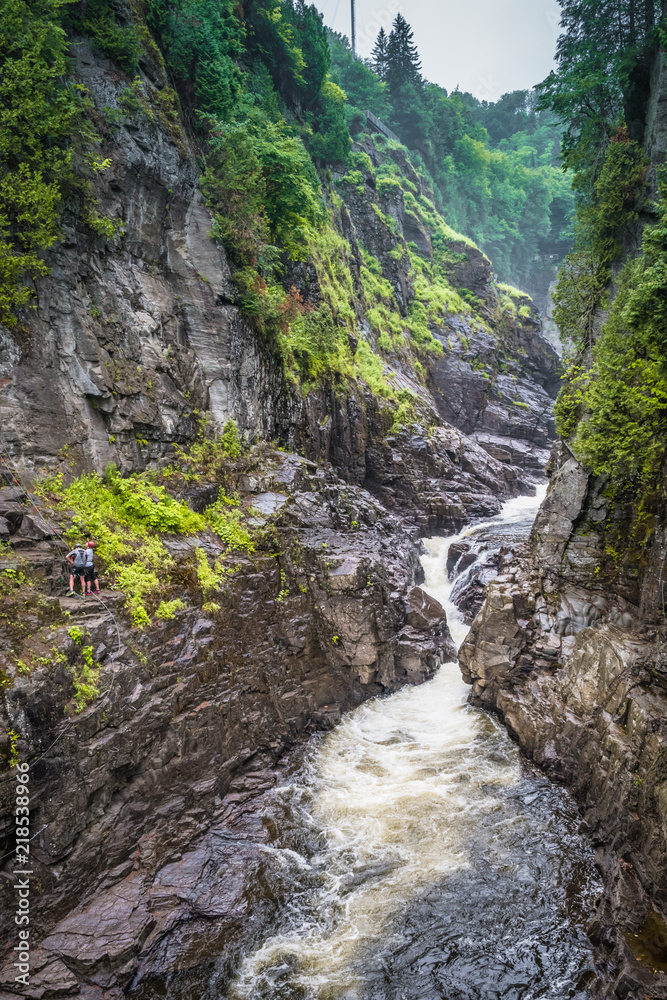 QUEBEC CITY, QUEBEC / CANADA - JULY 14 2018: Canyon Ste-Anne at rainy day