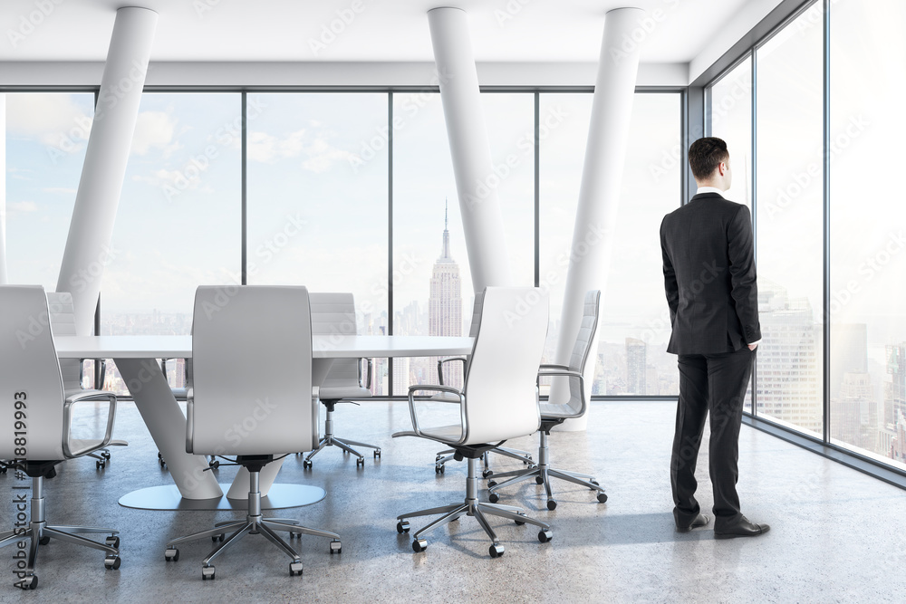 Thoughtful businessman in conference room