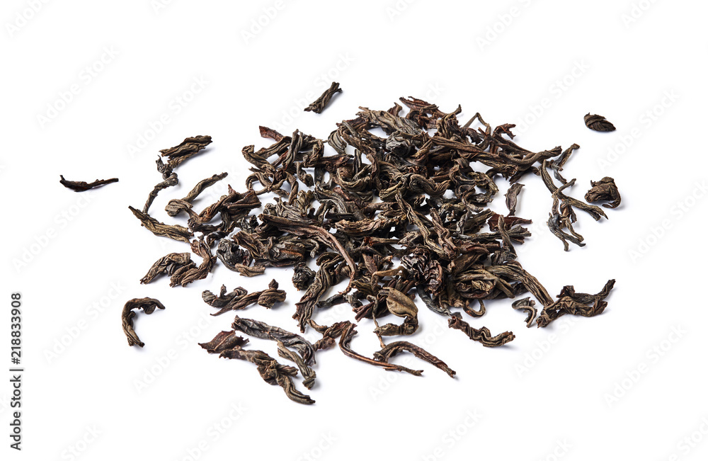 Heap of dried black tea leaves isolated on white background.