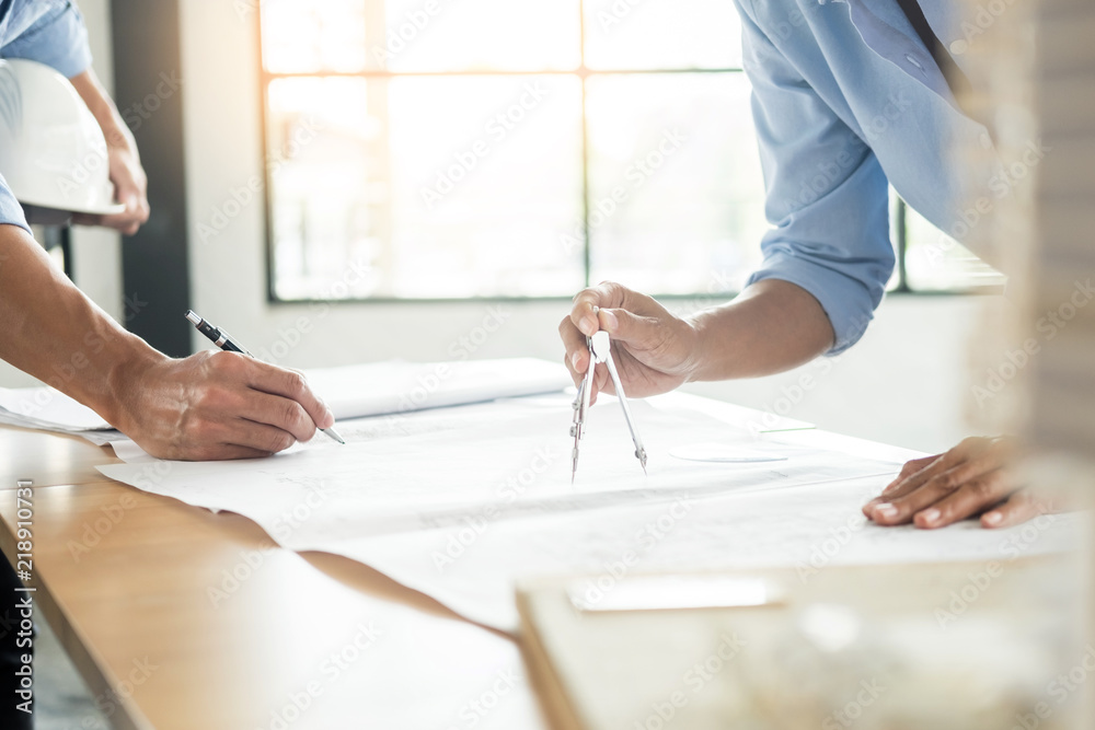 Close-up Of Persons engineer Hand Drawing Plan On Blue Print with architect equipment, Architects d