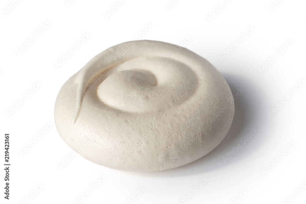 White swirl shaped meringue isolated on white.