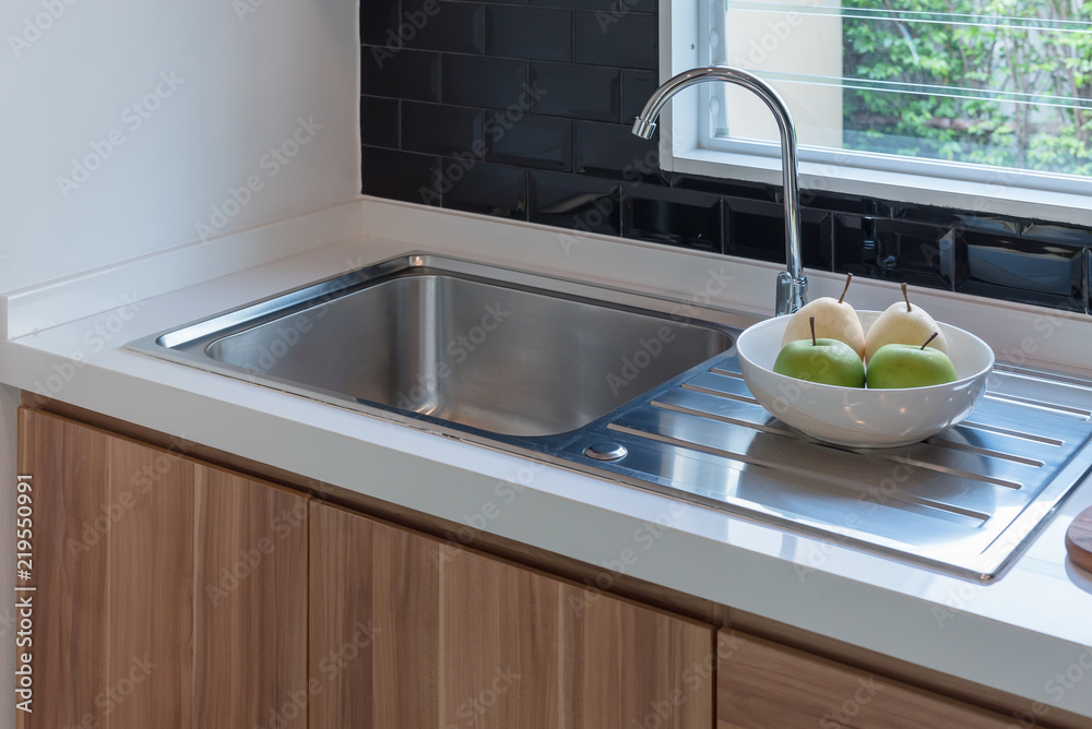 sink with faucet in kitchen room