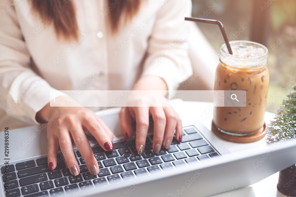 Searching and browsing concept. Woman using laptop to searching information on internet. soft focus,