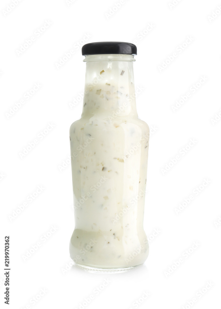 Bottle with tasty sauce on white background