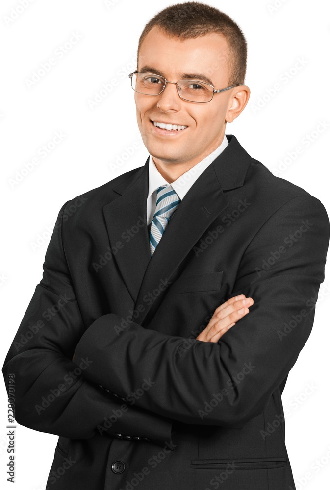 Smiling Businessman with Glasses and Arms Folded - Isolated