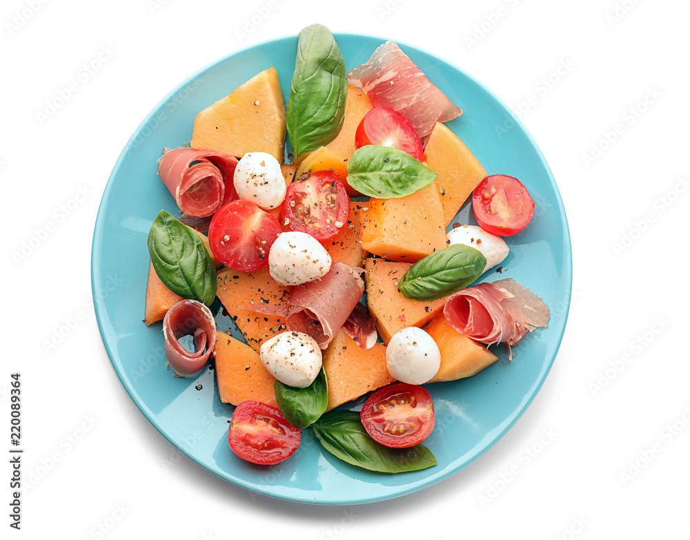 Delicious salad with melon and prosciutto on white background