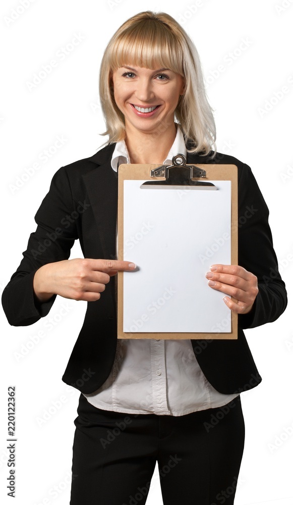 Businesswoman holding a clipboard with a blank piece of paper on