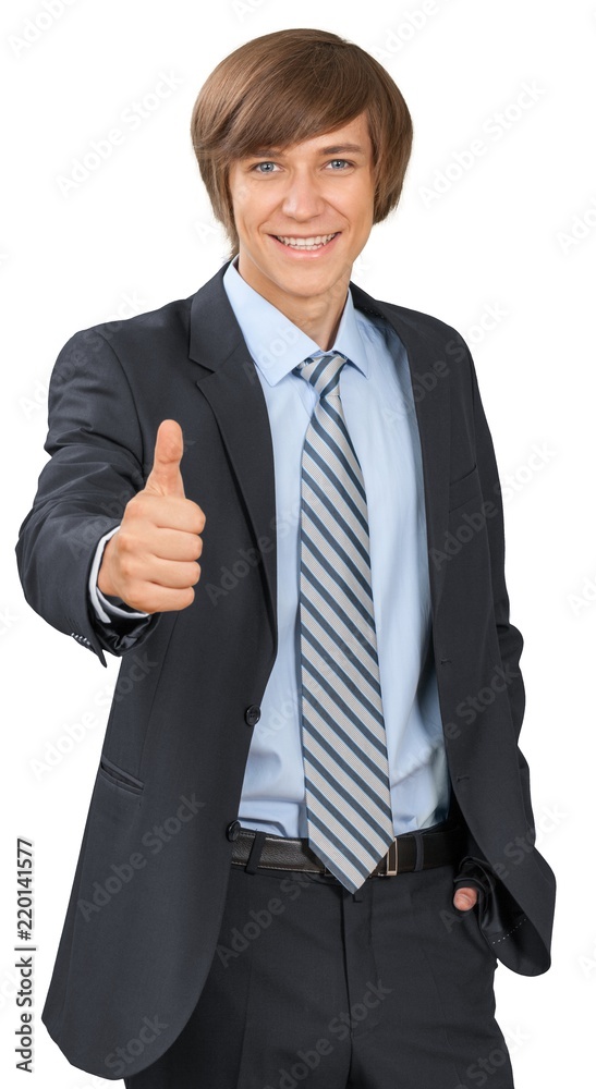 Young male in business suit giving thumbs up