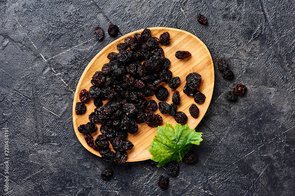 Dried cherry on plate. Top view of berries.