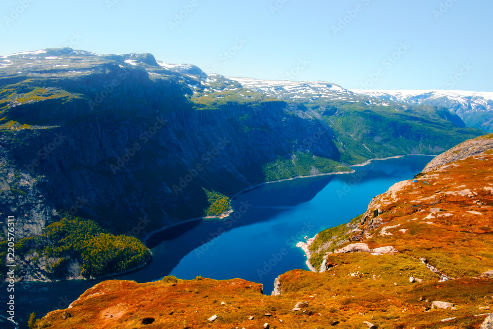 Panorama of Ringedalsvatnet lake near Trolltunga rock - most spectacular and famous scenic cliff in 