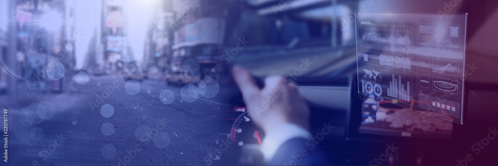 Man driving in car with heads up display interface and city