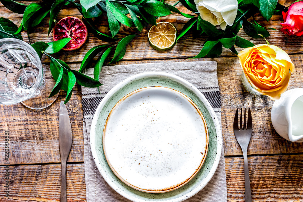 ceramic tableware top view on wooden background mock up