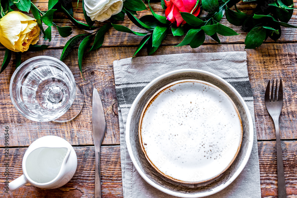 ceramic tableware top view on wooden background mock up