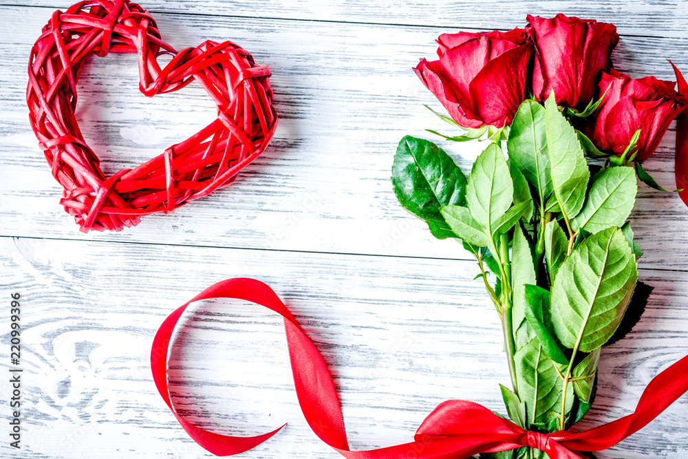 concept Valentines Day with flower wooden background top view