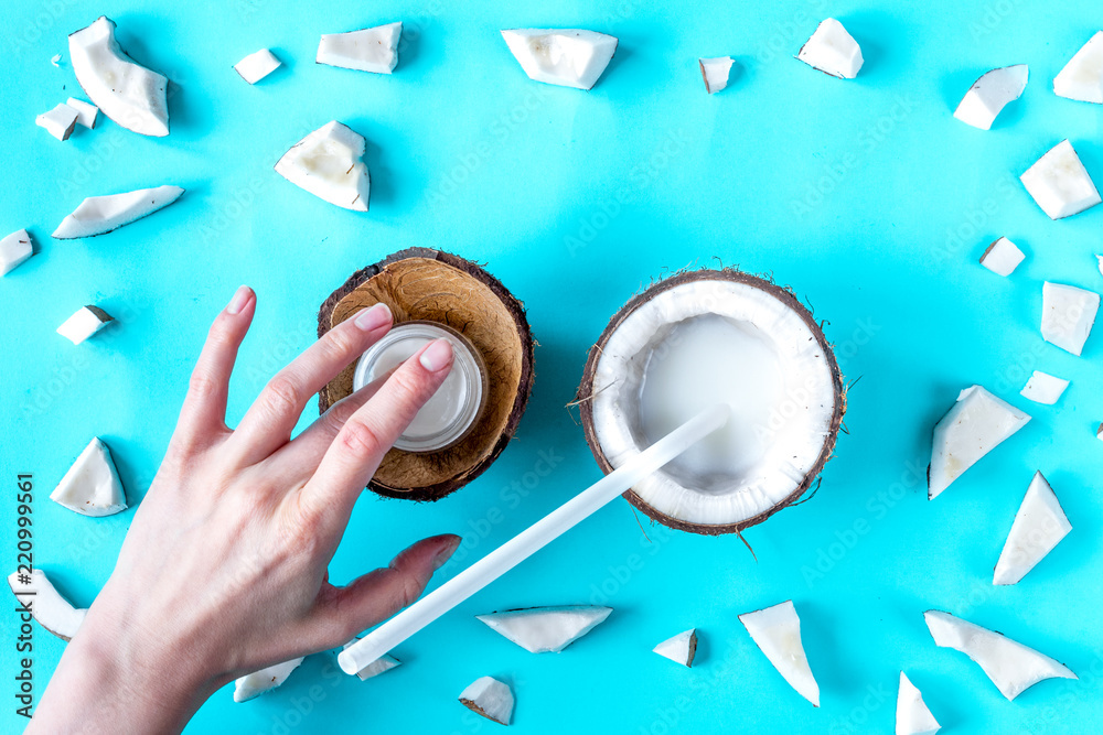 concept organic cosmetics with coconut on blue background top vi