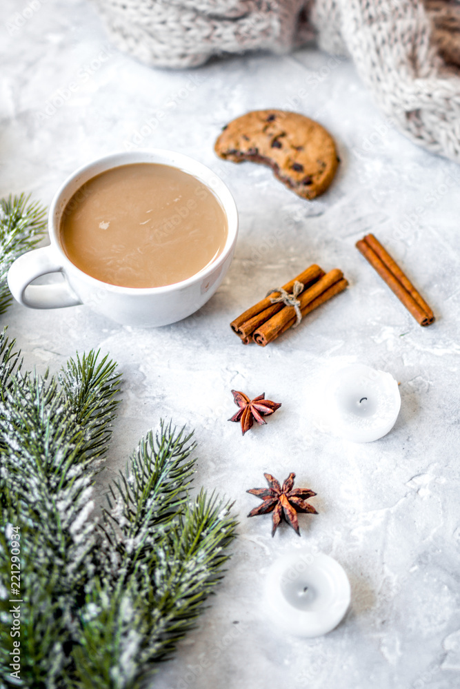 Christmas evening with cup of cocoa white background top view