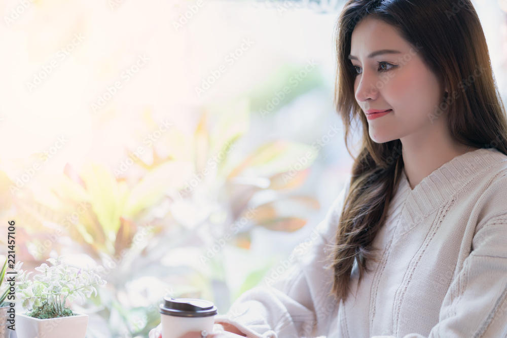 beautiful asian woman enjoy hot drink morninig time near window in cafe shop lifestyle ideas concept