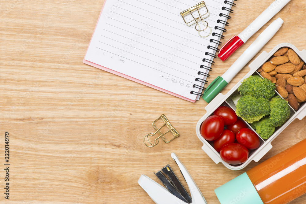 preparing lunch for child school top view on wooden background