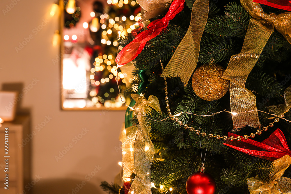 Beautiful decorated Christmas tree in living room