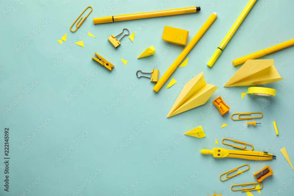 Set of school stationery on color background