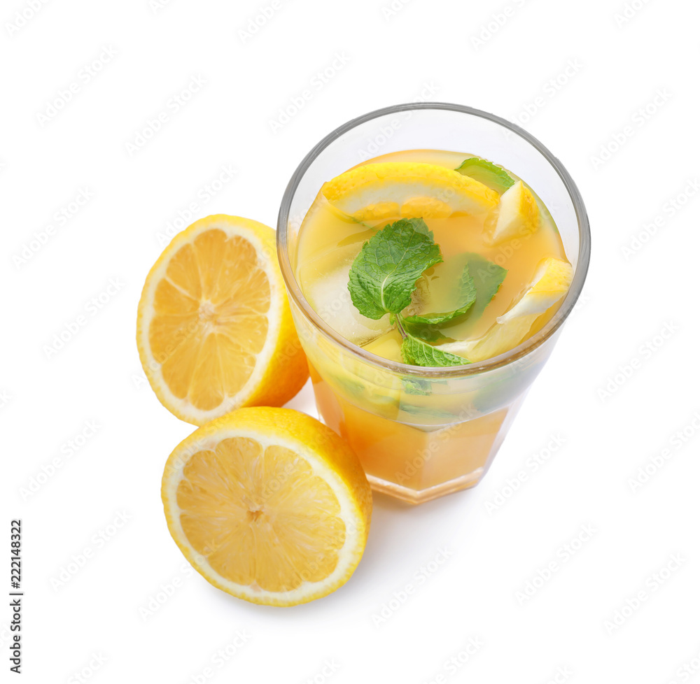 Glass of fresh cocktail with lemon on white background