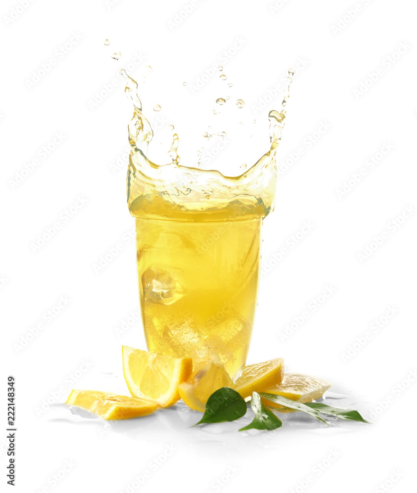 Glass of fresh lemonade with splashes on white background