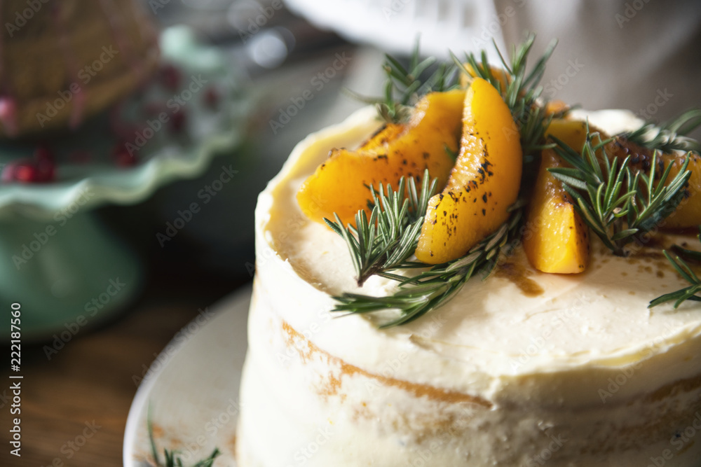 Buttercream cake with apricot and rosemary