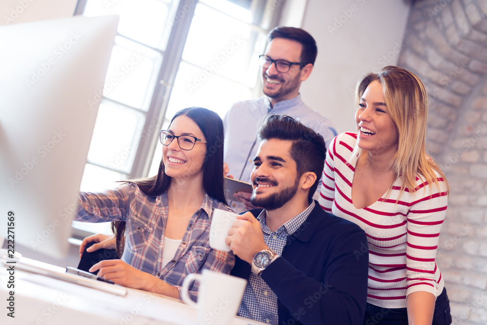 Picture of young architects discussing in office