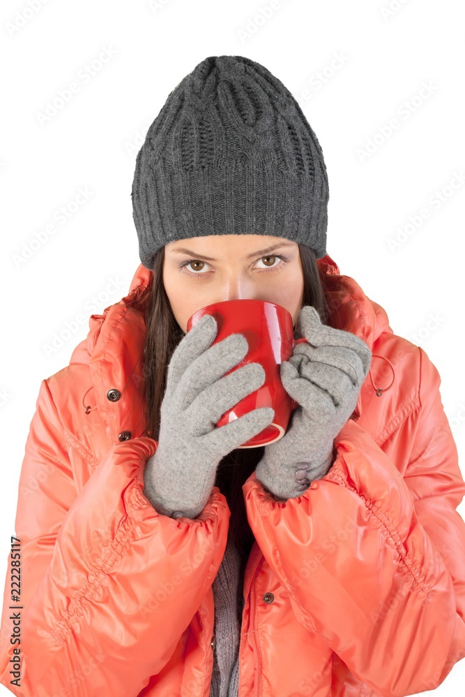 Pretty young woman holding red cup isolated on white background