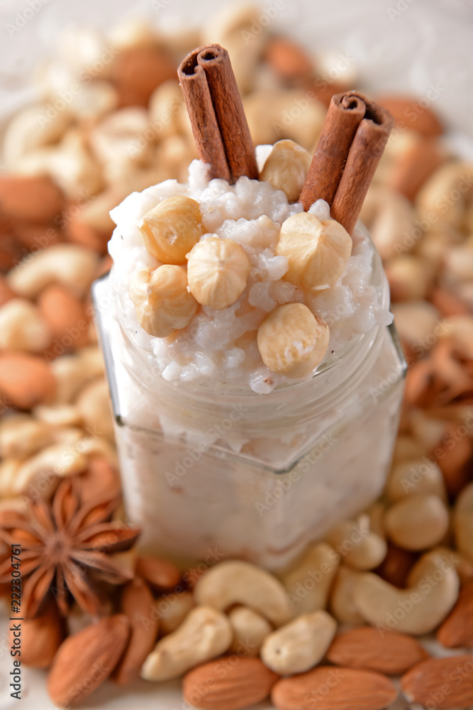 Mason jar with delicious rice pudding and nuts