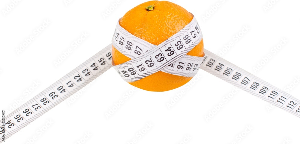 Orange with tape measurer around it - diet concept