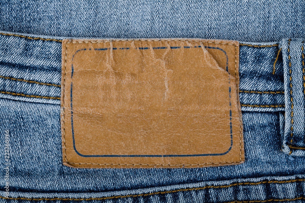 Blank Leather Jeans Label Sewed on a Blue Jeans