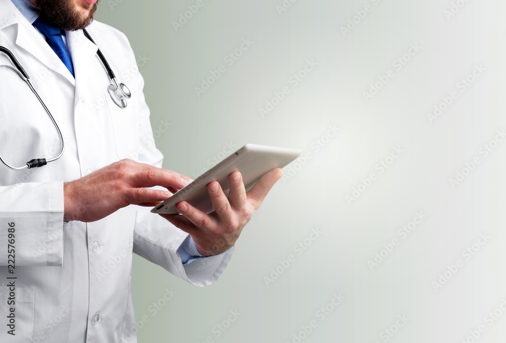 Close-up Doctor at hospital working with tablet pc