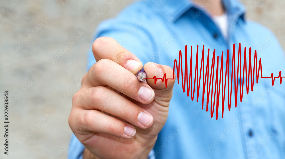 Businessman drawing a heart beat sketch