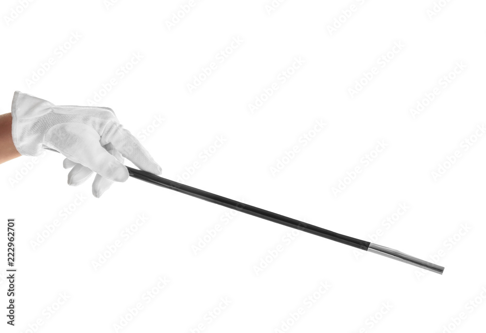 Hand of magician showing trick with wand on white background