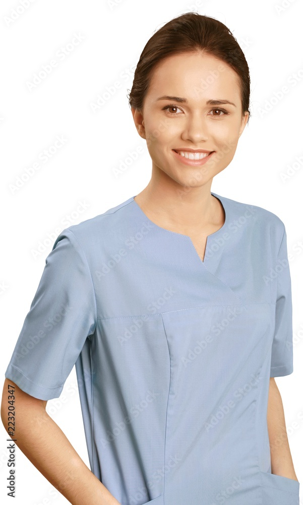 Female healthcare practitioner wearing scrubs