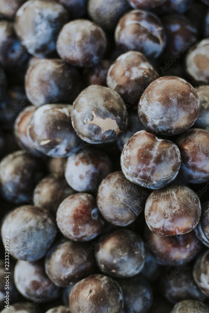 Fresh plums at a farmers market