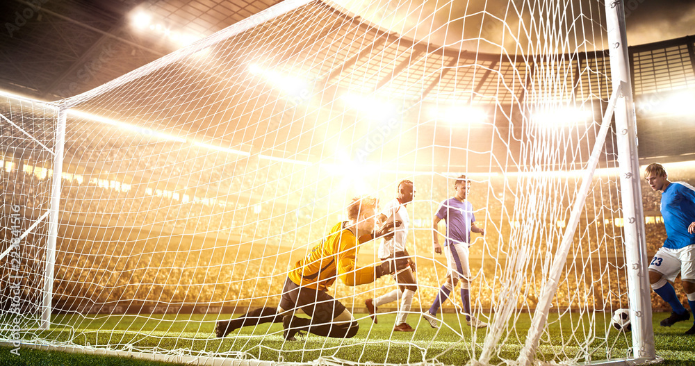 Intense soccer moment in front of the goal on the professional soccer stadium.