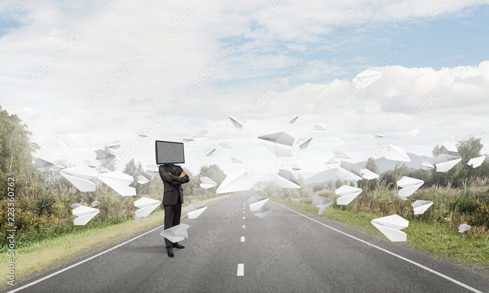 Businessman with TV instead of head.