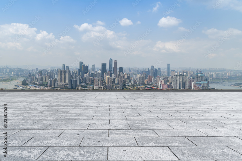 Urban skyscrapers with empty square floor tiles