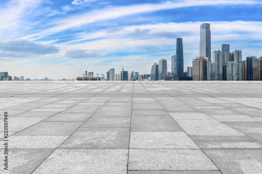 Urban skyscrapers with empty square floor tiles