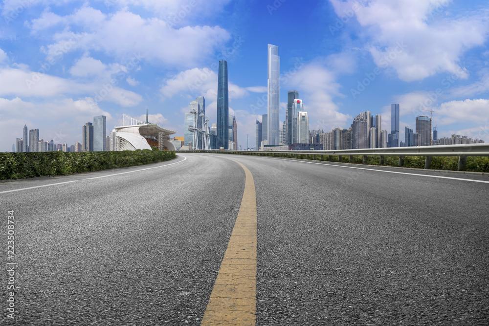 Road pavement and Guangzhou city buildings skyline