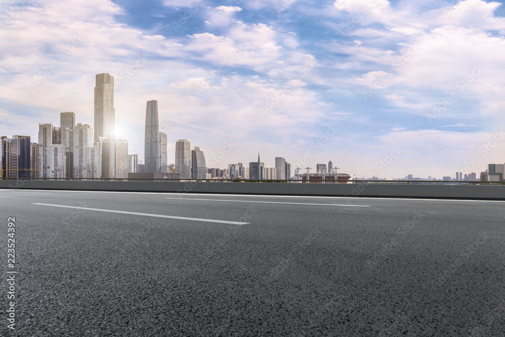 Road pavement and Guangzhou city buildings skyline